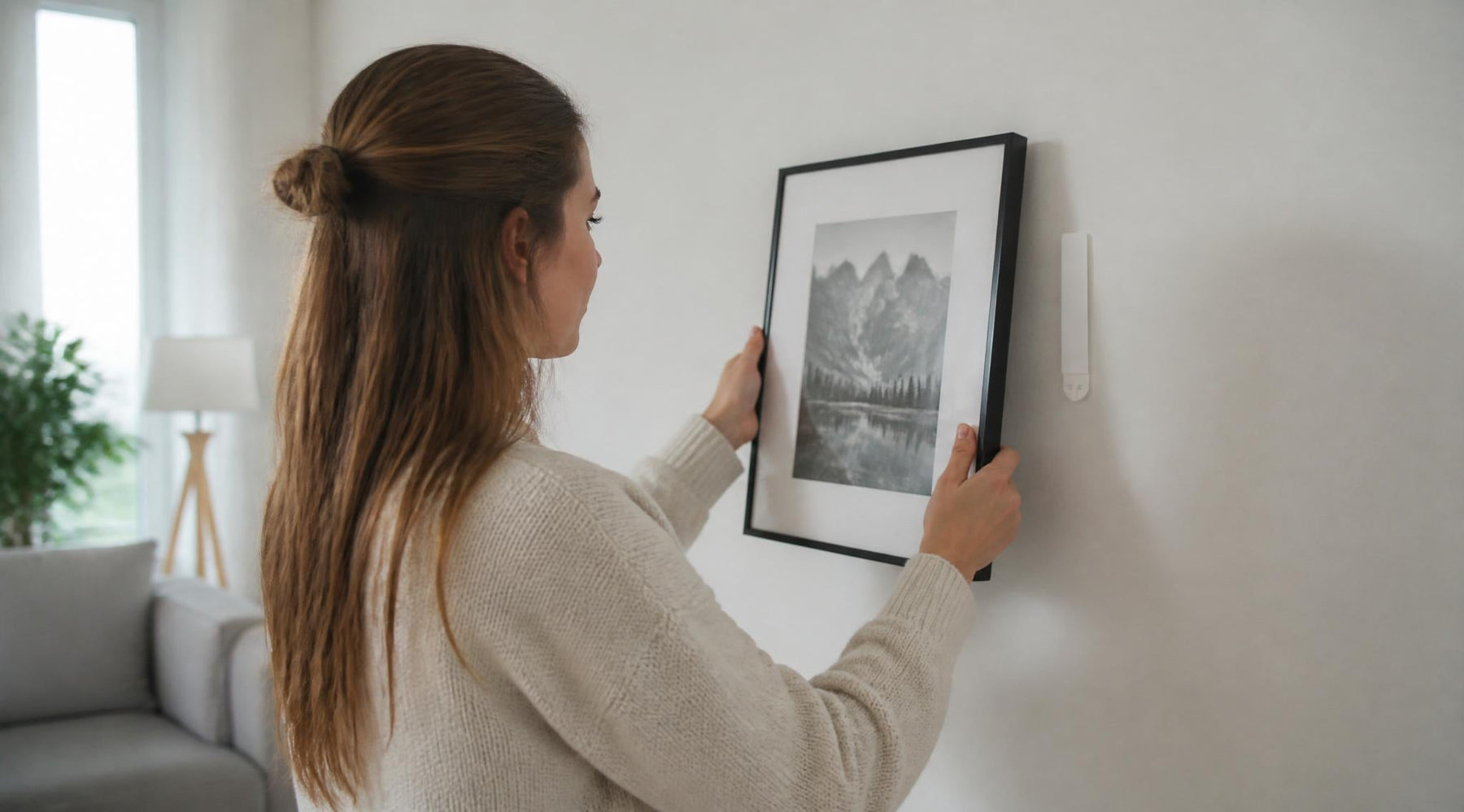 fotolijst ophangen zonder te boren met zelfklevende strips
