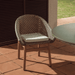 Kave Home Tuinstoel Olbia Rattan en teakhout - Groen